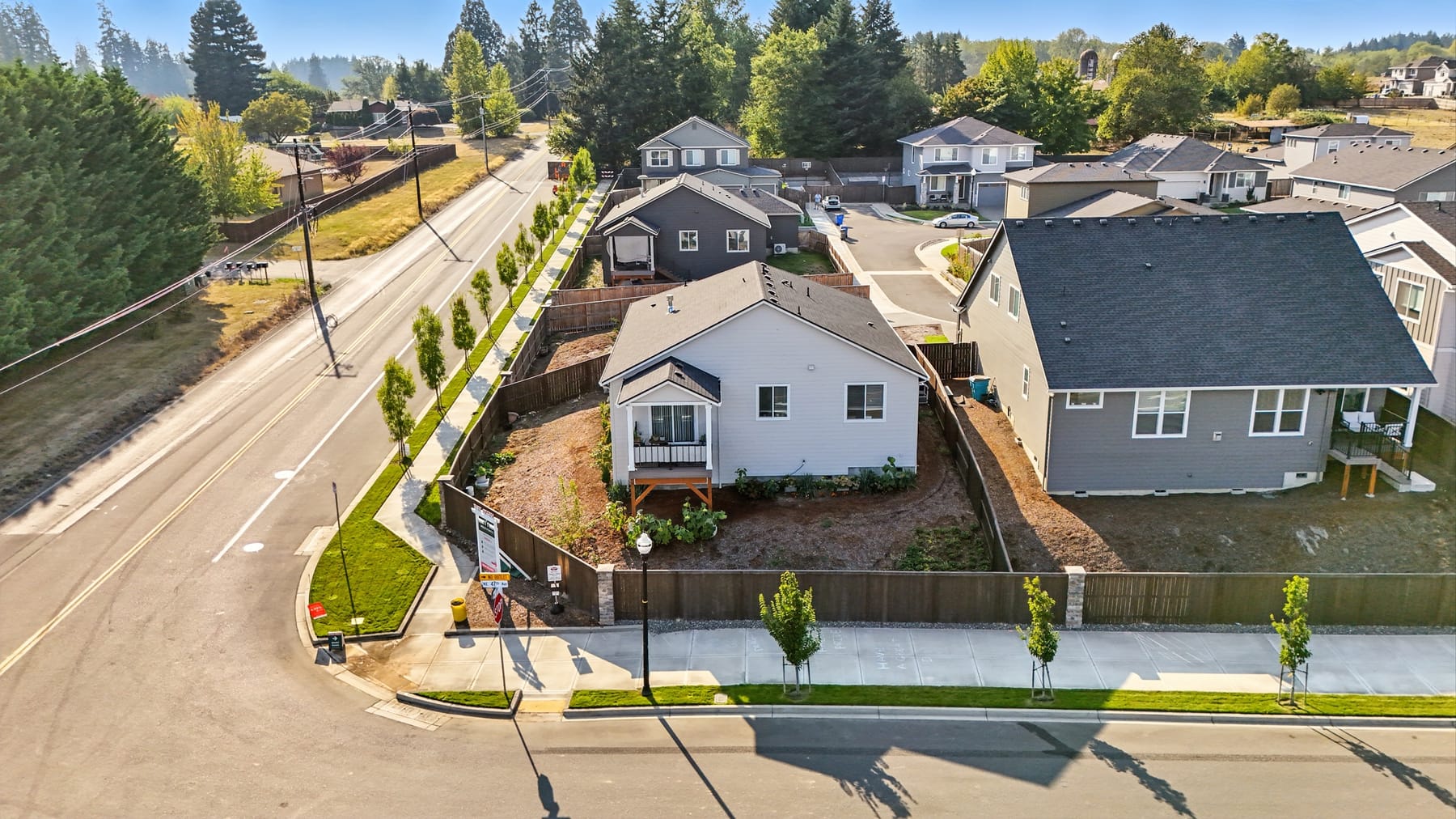 Aerial view of the property and neighborhood