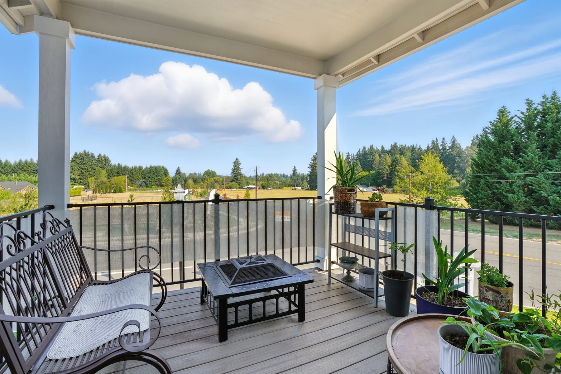 Covered deck overlooking the surrounding farmland