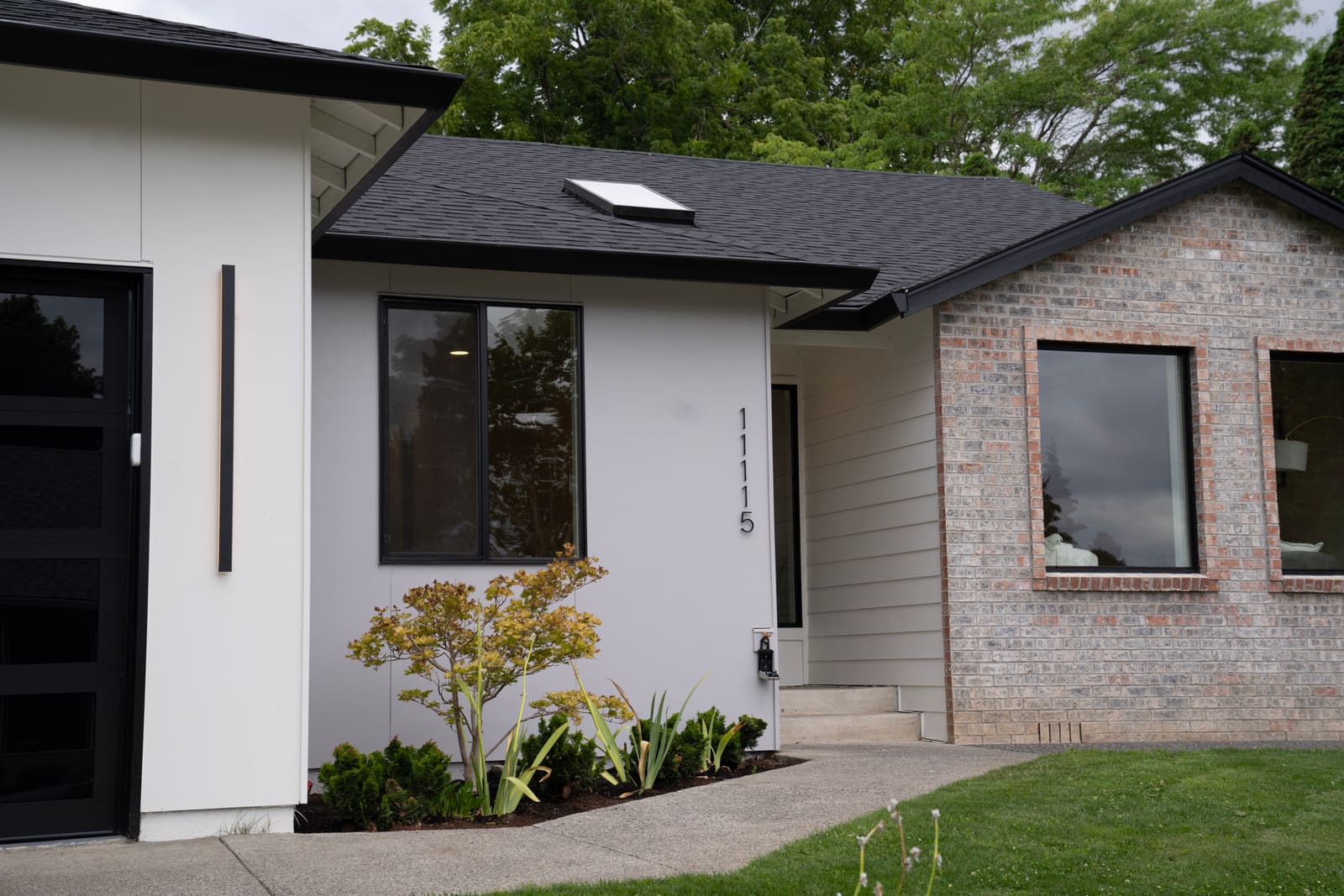 Modern new-construction home exterior at 11115